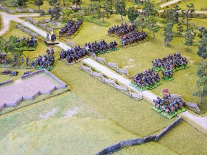 13th Virginia (furthest right), flanked by 10th Virginia and supported by 2nd North Carolina, just moments before the first bluecoat cavalry crashed into them. The bodies of their comrades of 9th Virginia litter the ground before the Union guns to the left of the picture.